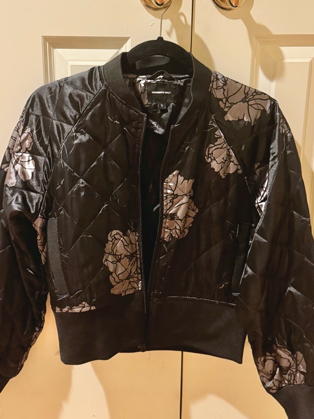 Members Only brand black floral silk satin bomber jacket with quilting detail